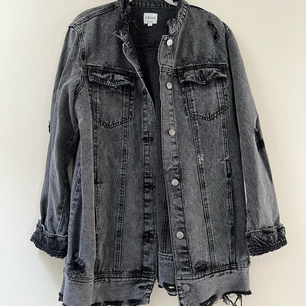 Oversized black denim jacket with rip details